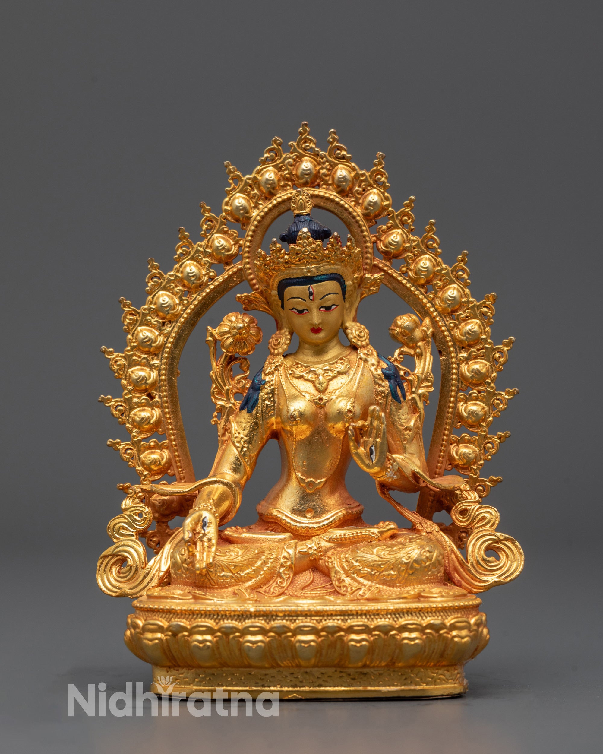 White Tara Statue seated on lotus base with seven eyes and 24k gold gilding