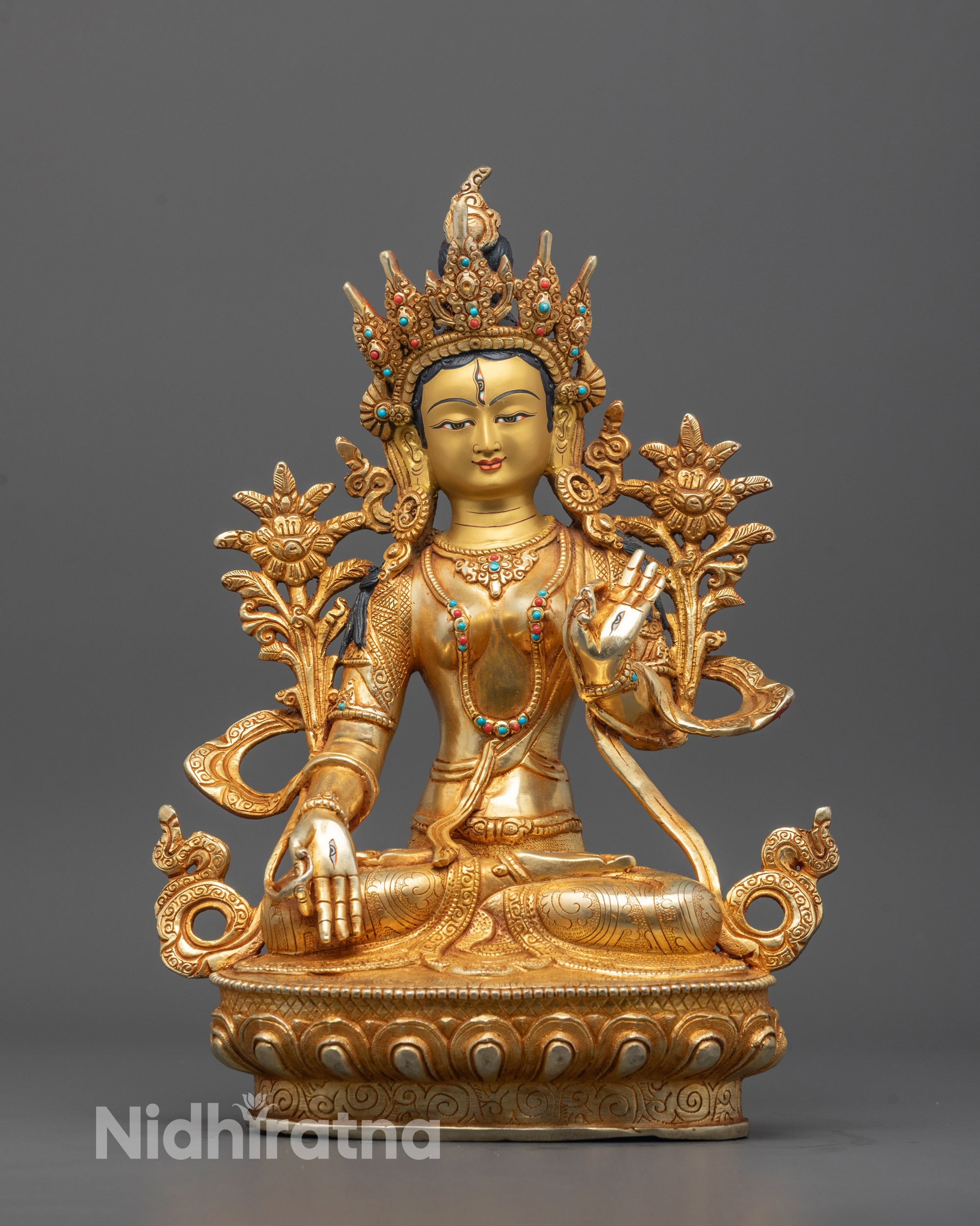 White Tara Statue seated on lotus in meditative posture with Seven Eyes