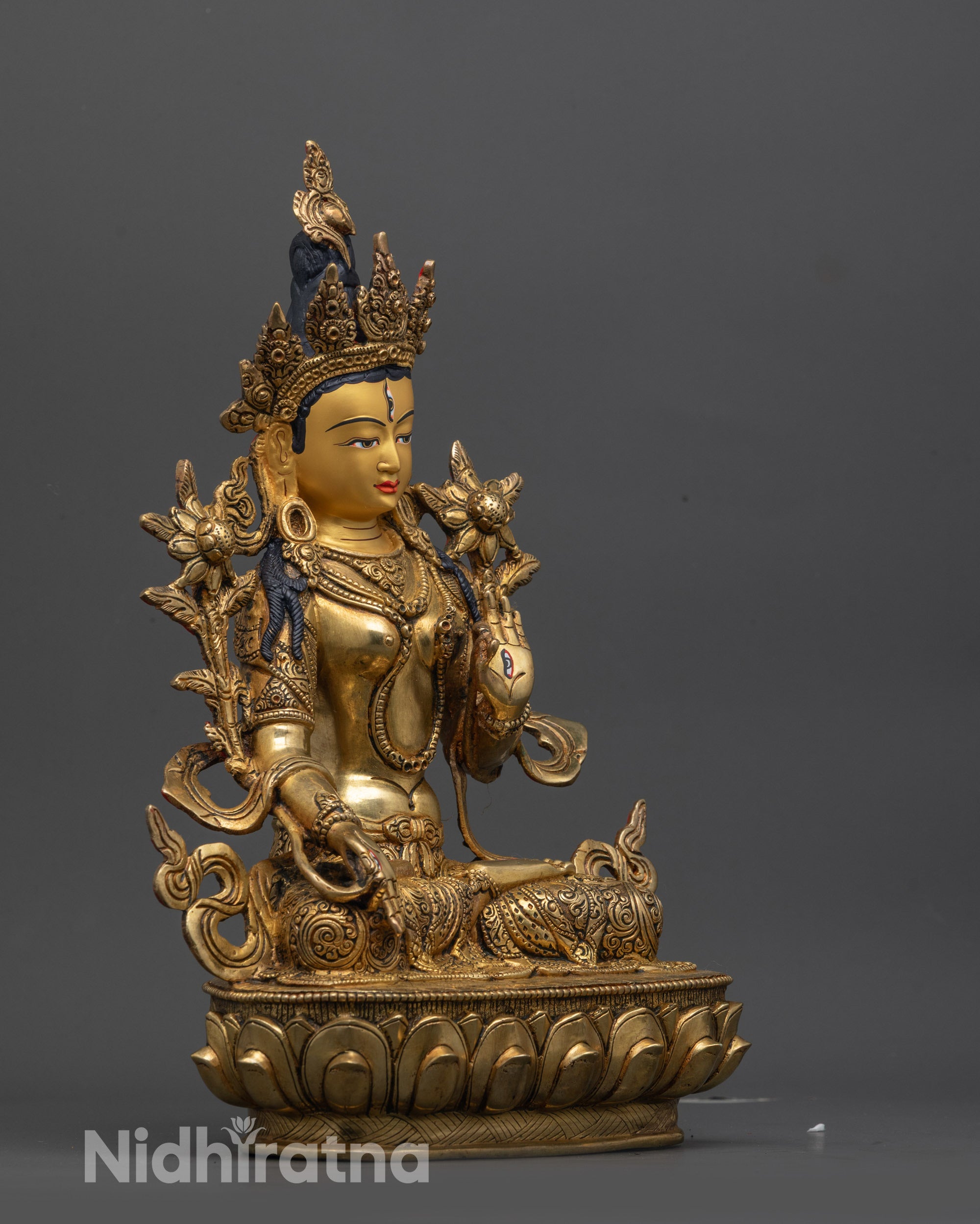 White Tara Statue side view highlighting seated posture and seven wisdom eyes
