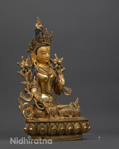 White Tara Statue side view highlighting seated posture and seven wisdom eyes
