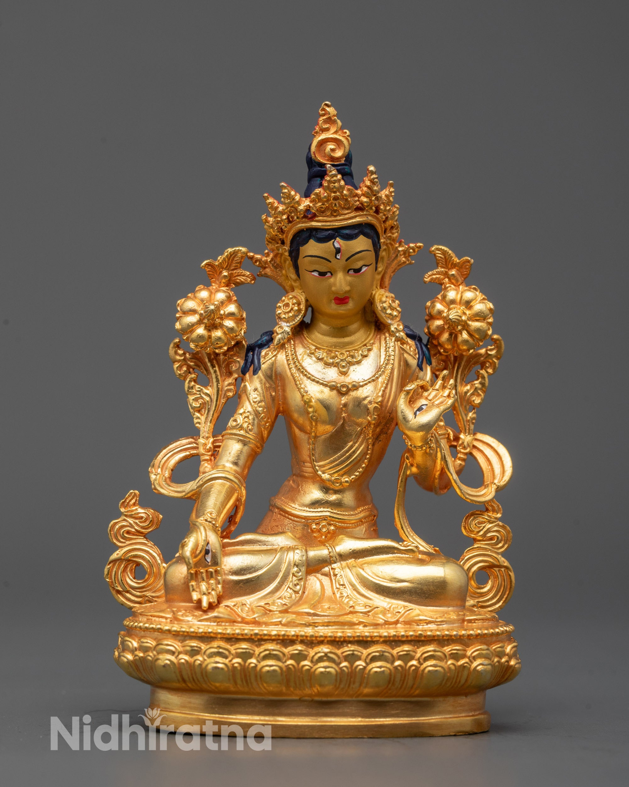 White Tara Statue with silver-plated body seated on lotus base handcrafted in Nepal