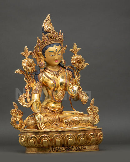White Tara copper statue right side showing intricate gold and lotus details