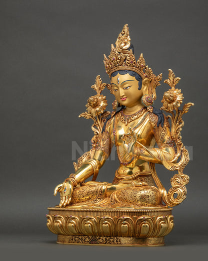 White Tara left side view with layered gold fire-gilding and ornate carvings