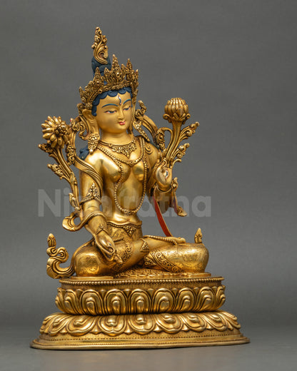 White Tara right side view fire-gilded copper Himalayan Buddhist sculpture