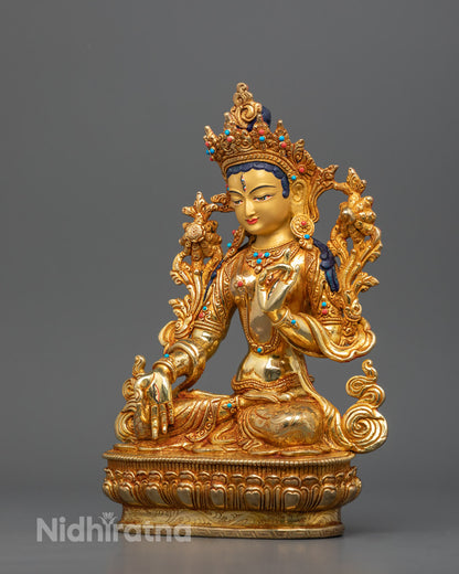 Goddess White Tara's serene face with delicate features and 24K gold plating, radiating purity and divine compassion.