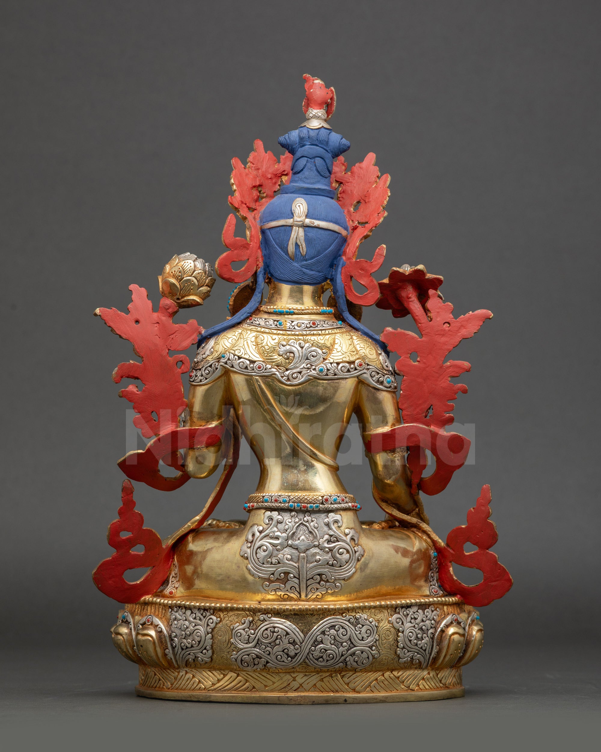 White Tara statue back view detailed robes lotus pedestal Nepalese artwork