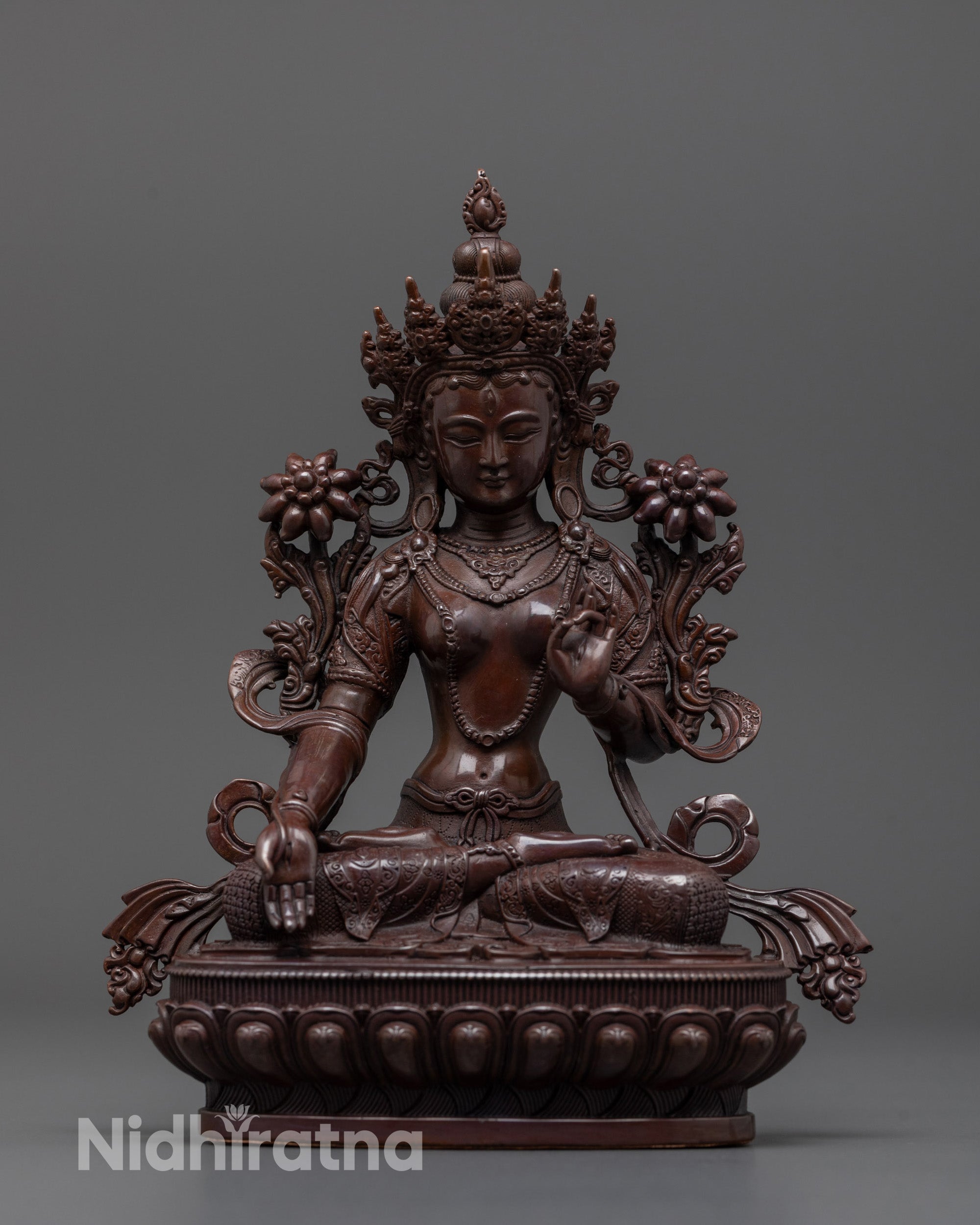 White Tara statue front view in oxidized copper, machine-made with detailed seven eyes