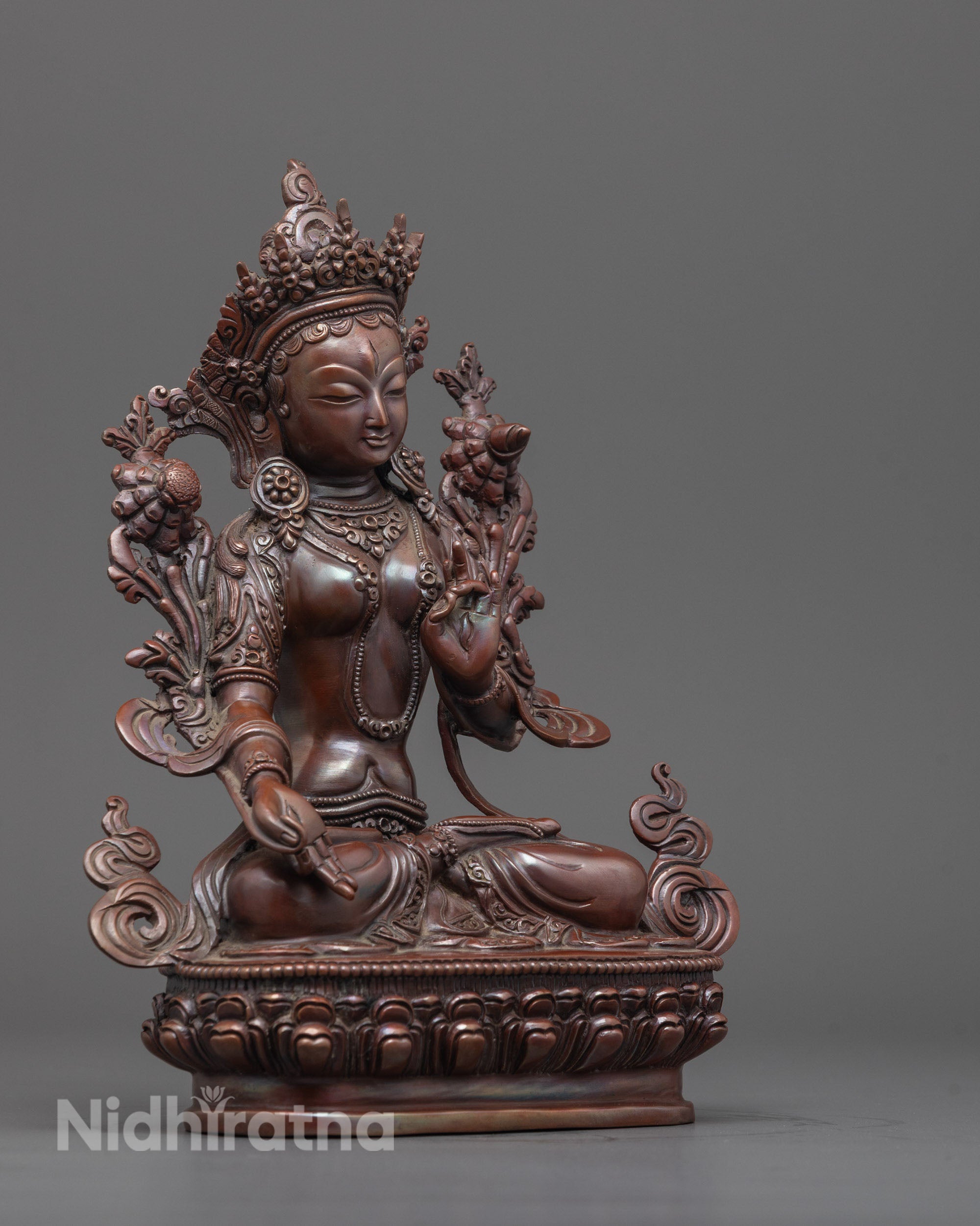 White Tara statue in varada mudra holding utpala flower, handcrafted in Nepal