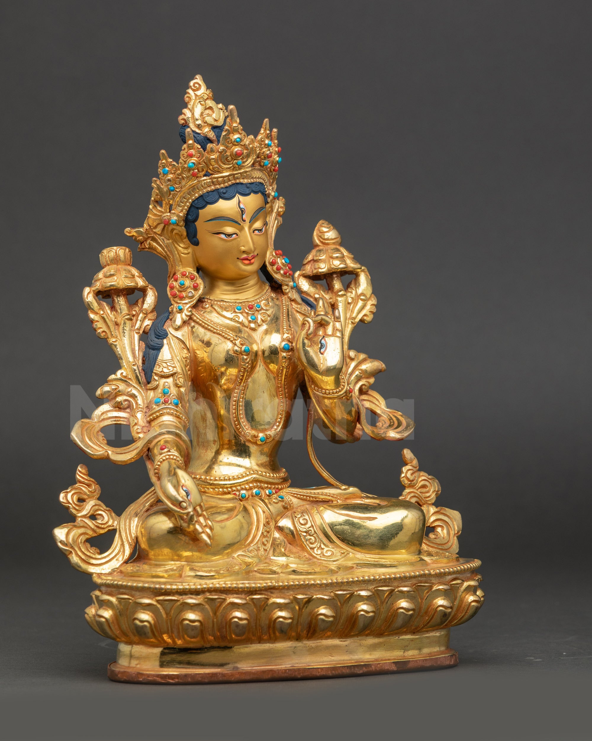 White Tara statue right side view showing posture and craftsmanship