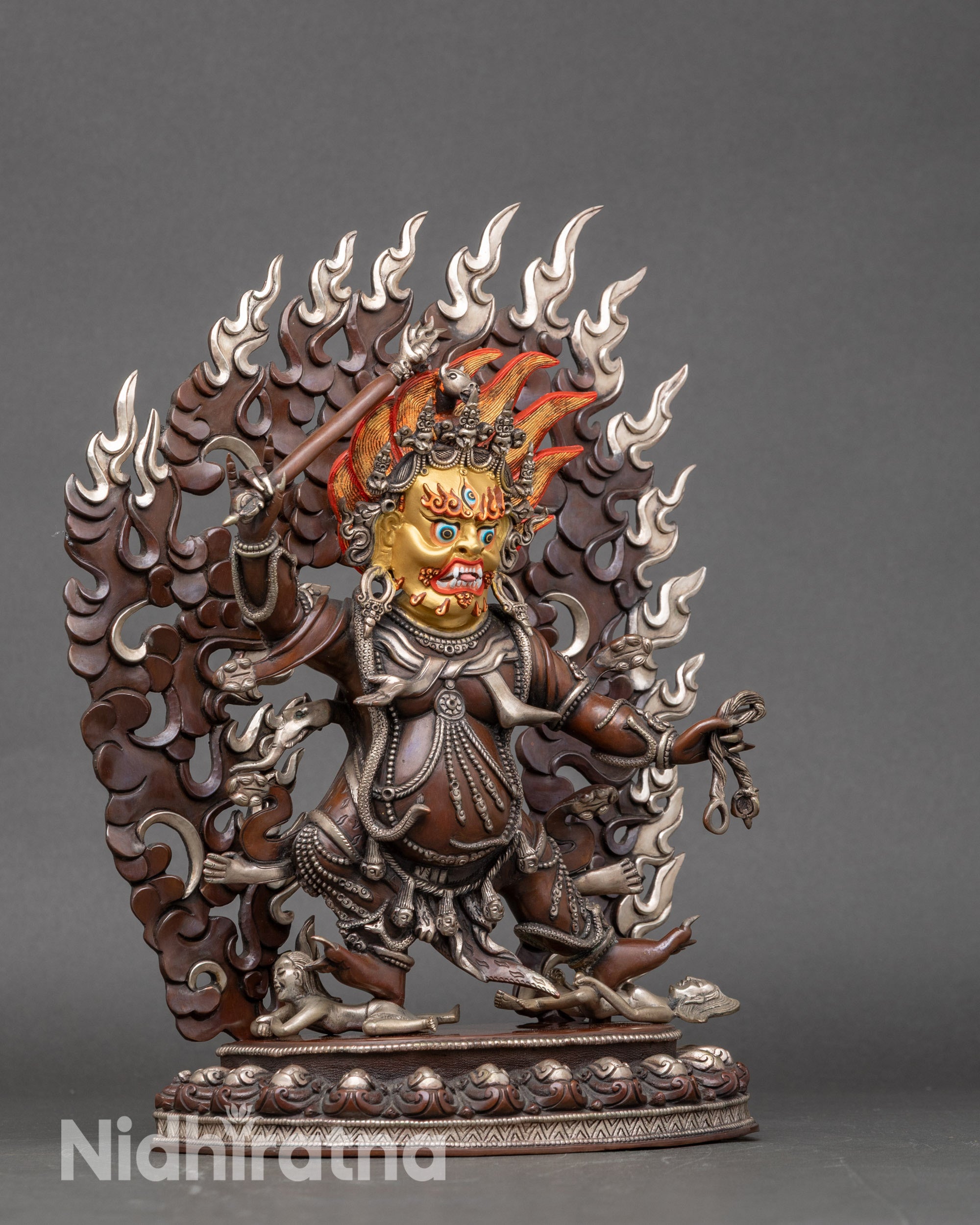 Wrathful Hayagriva standing on lotus, subduing figures, Himalayan Buddhist protector statue