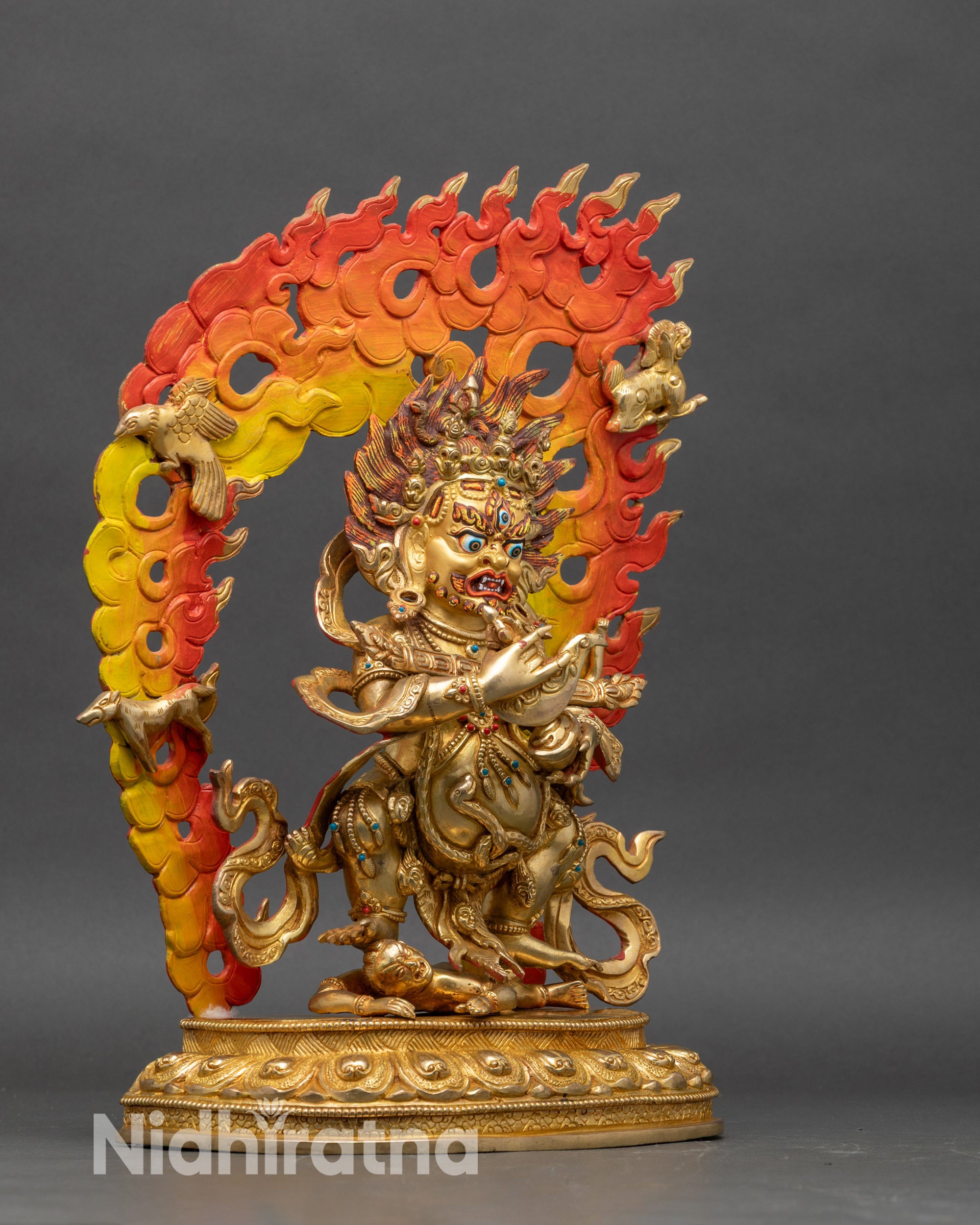 Wrathful Sakya Mahakala standing on lotus seat with flaming halo detail