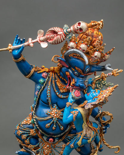 Yamantaka Statue face close-up with skull crown, horns, third eye, and fierce expression