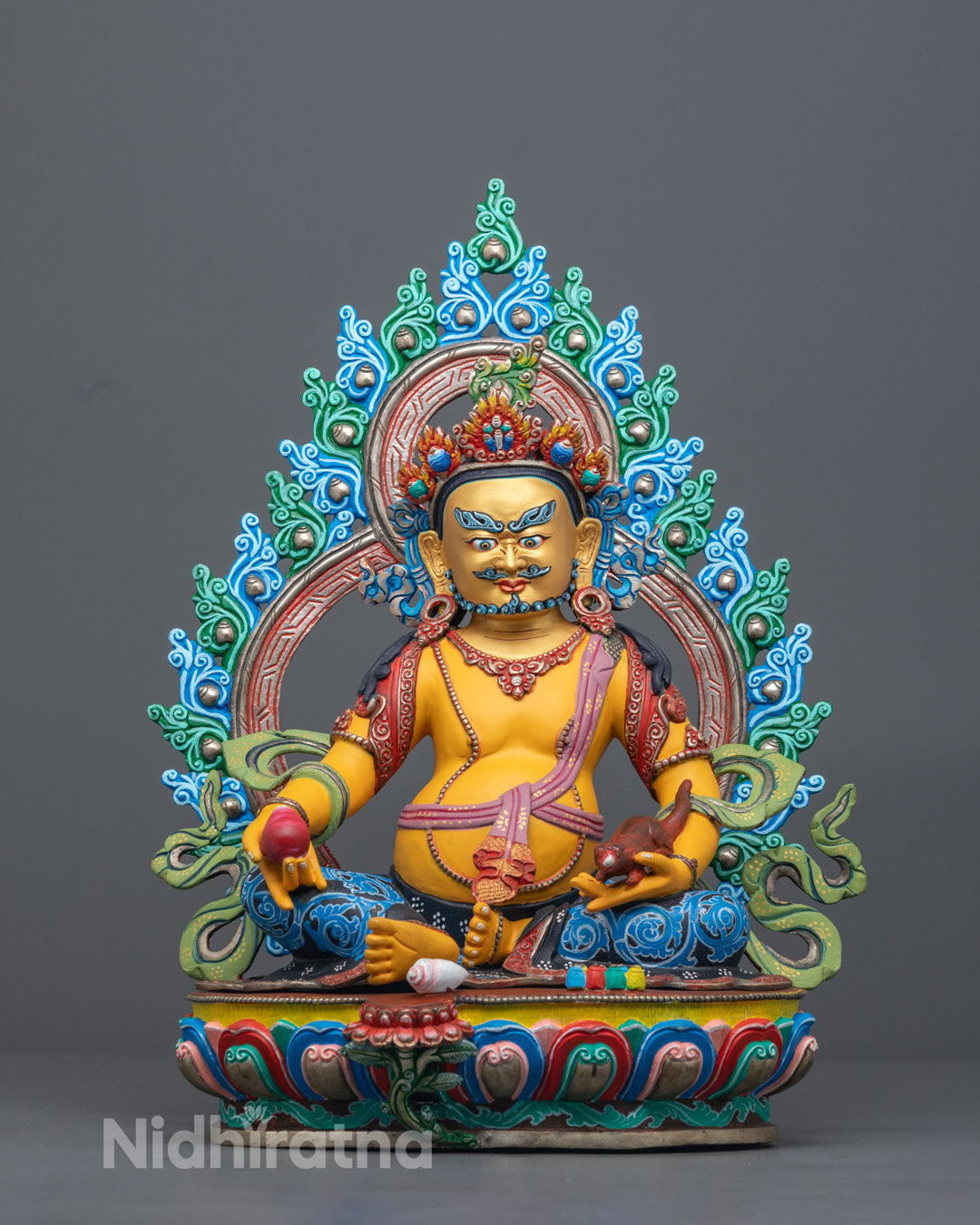 Yellow-Coloured Dzambhala sculpture handcrafted in copper with vibrant acrylic colors symbolizing spiritual wealth and abundance