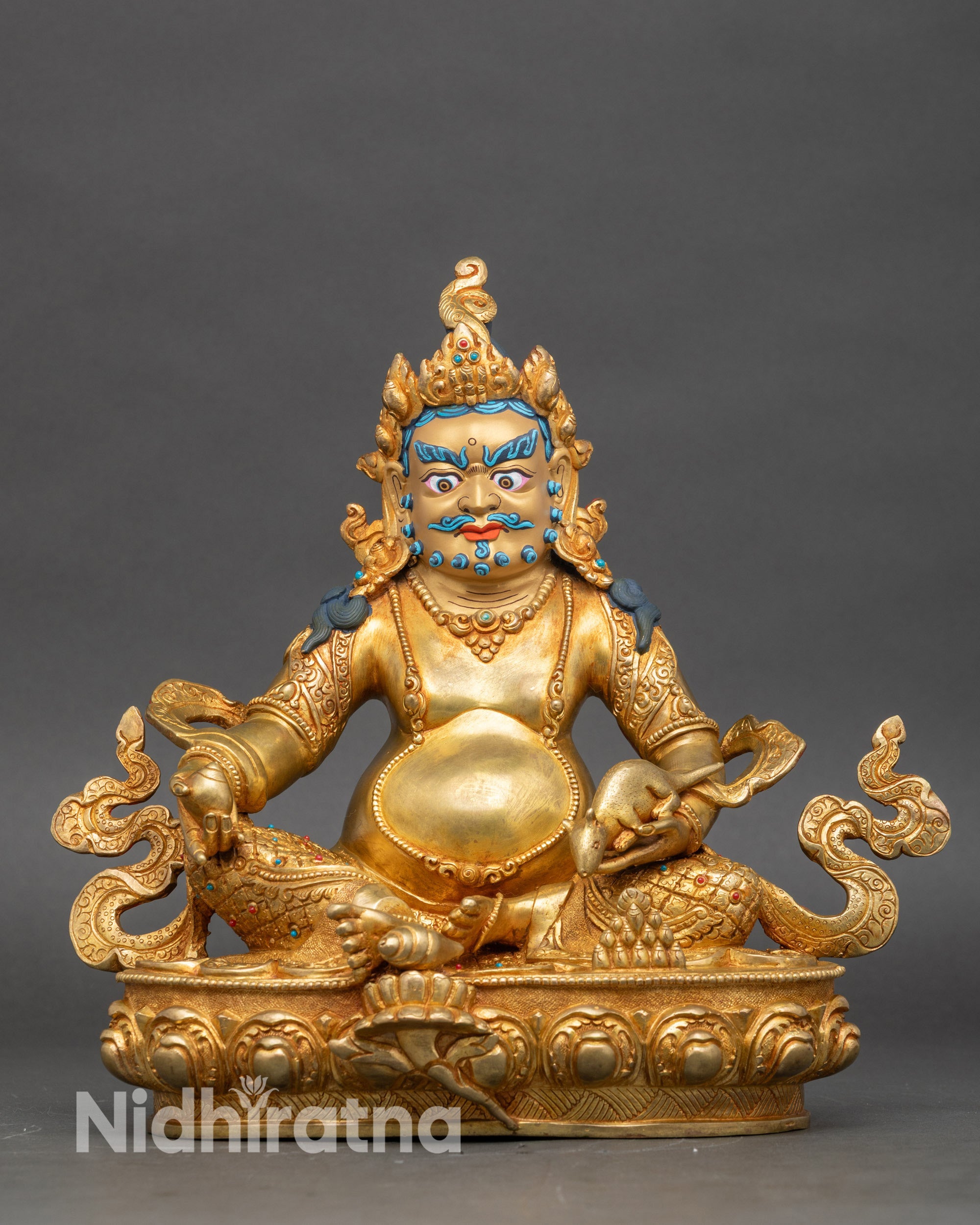 Yellow Dzambhala statue front view, copper with 24K gold gilding and semi-precious stones