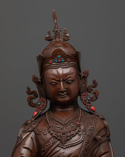 Zoom View of Padmasambhava statue adorned with semi-precious stones and antique finish