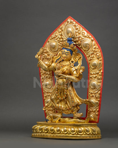 Handcrafted Achi Chokyi Drolma statue standing on lotus seat subduing negative forces