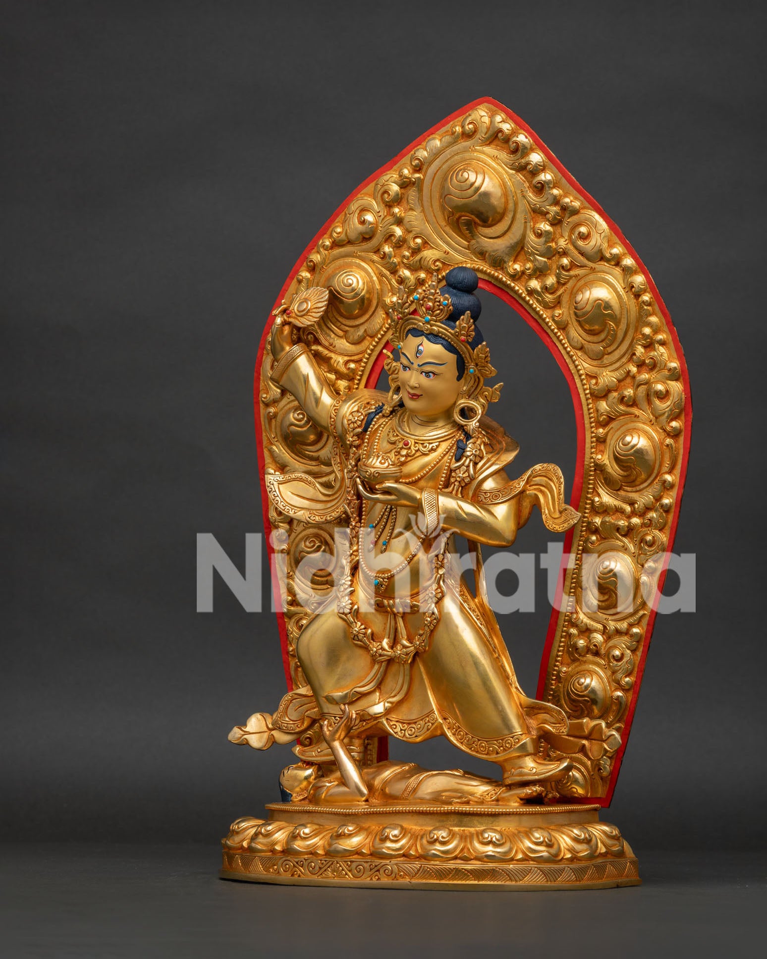 Achi Chokyi Drolma Statue, left-side view showcasing the striding pose