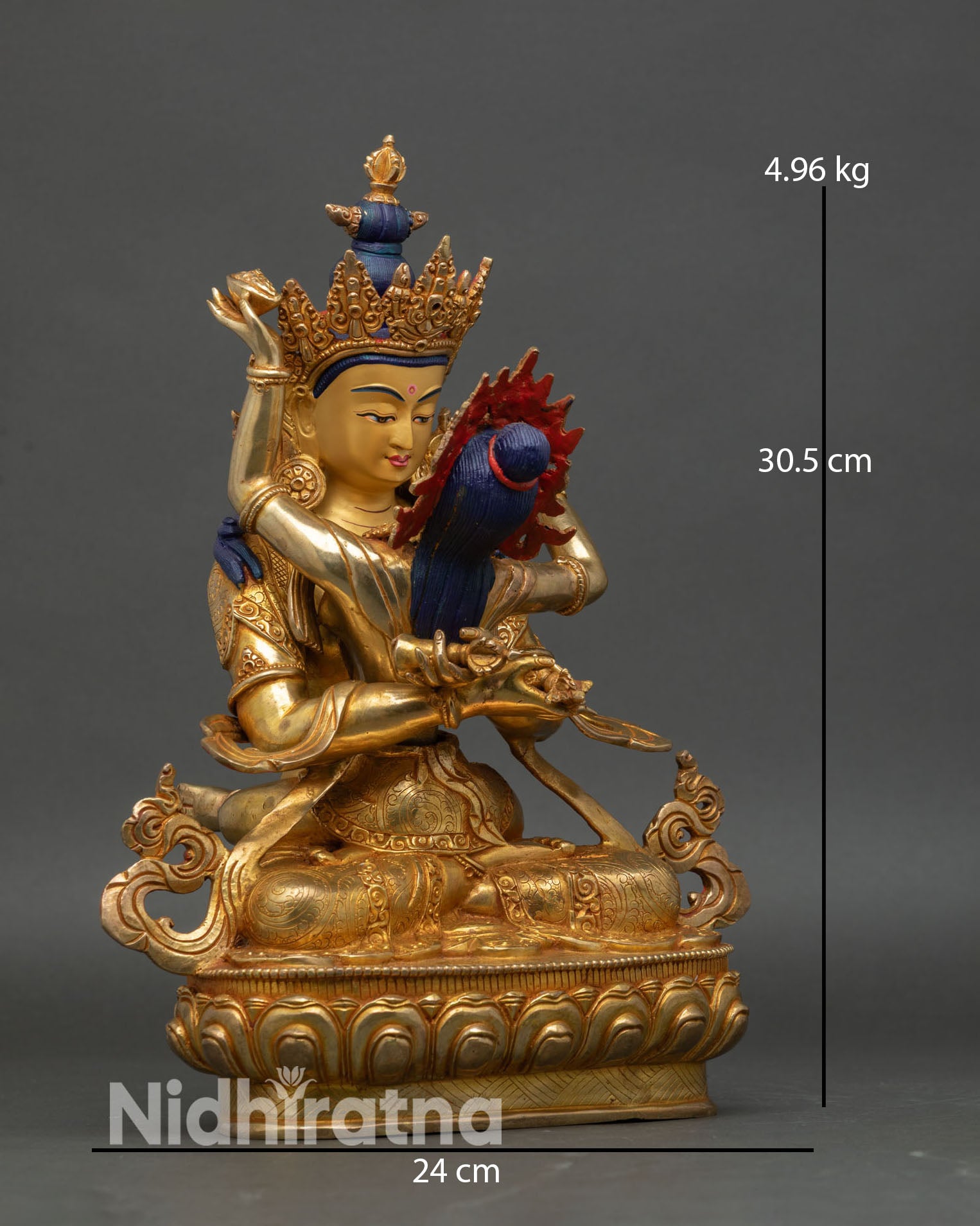 vajradhara and consort statue side view vajra and bell symbolism yab yum union deity sculpture