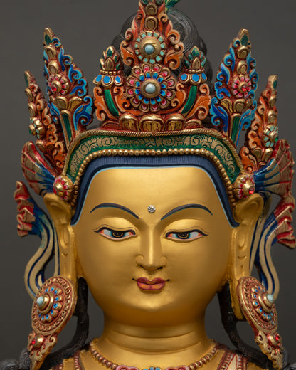 akshobhya buddha face close up gold painted serene expression nepal statue