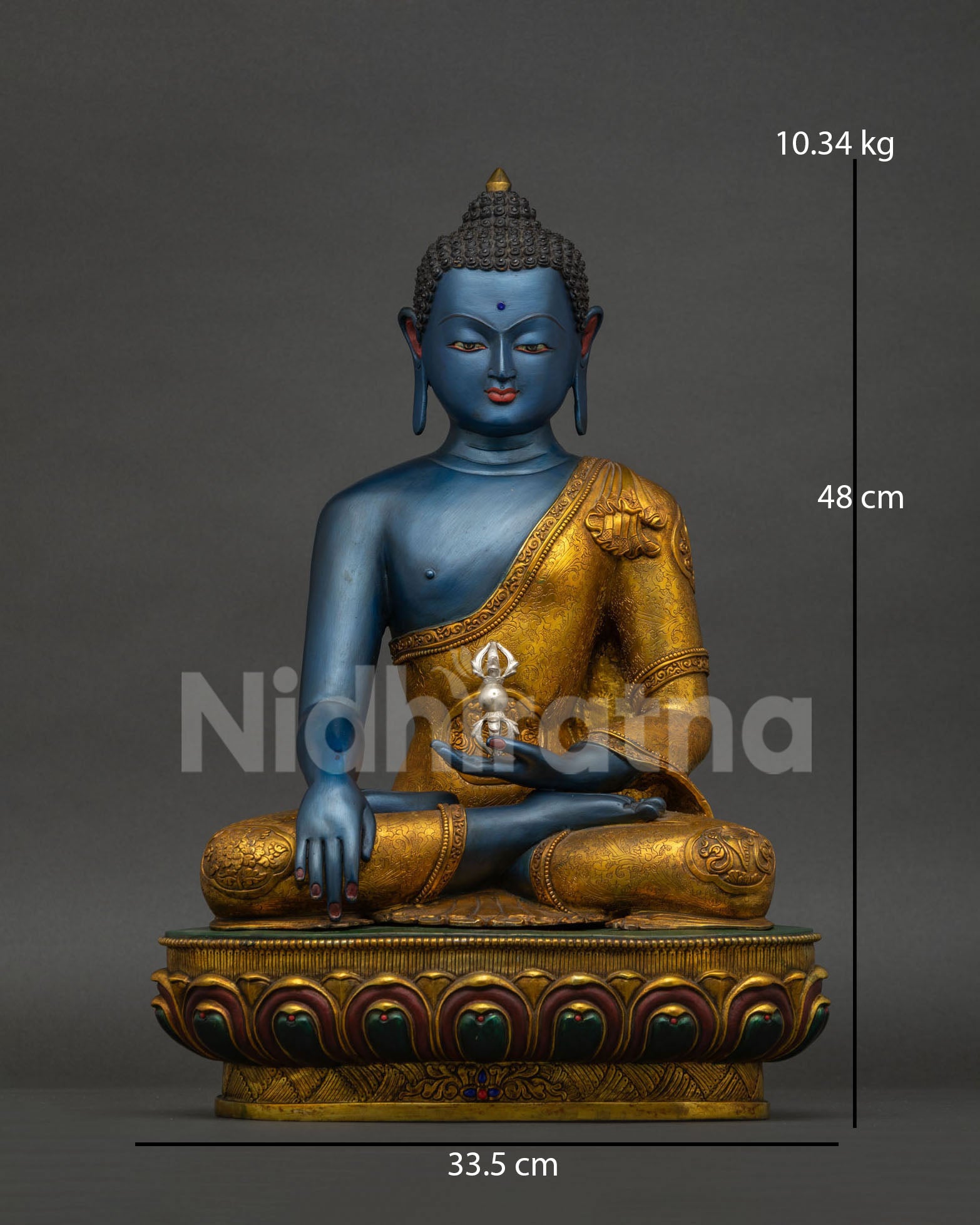 Akshobhya Buddha statue front view, handcrafted copper sculpture with gold gilding from Nepal
