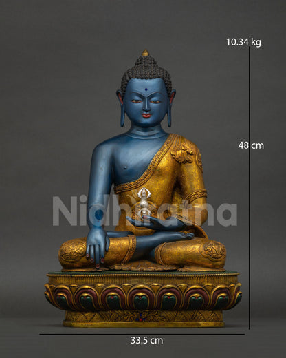 Akshobhya Buddha statue front view, handcrafted copper sculpture with gold gilding from Nepal