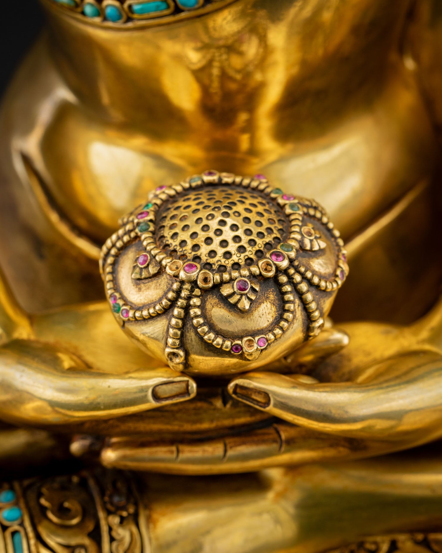 Amitabha Buddha Dhyana mudra hands holding Patra bowl close-up, fire-gilded copper, Nepal