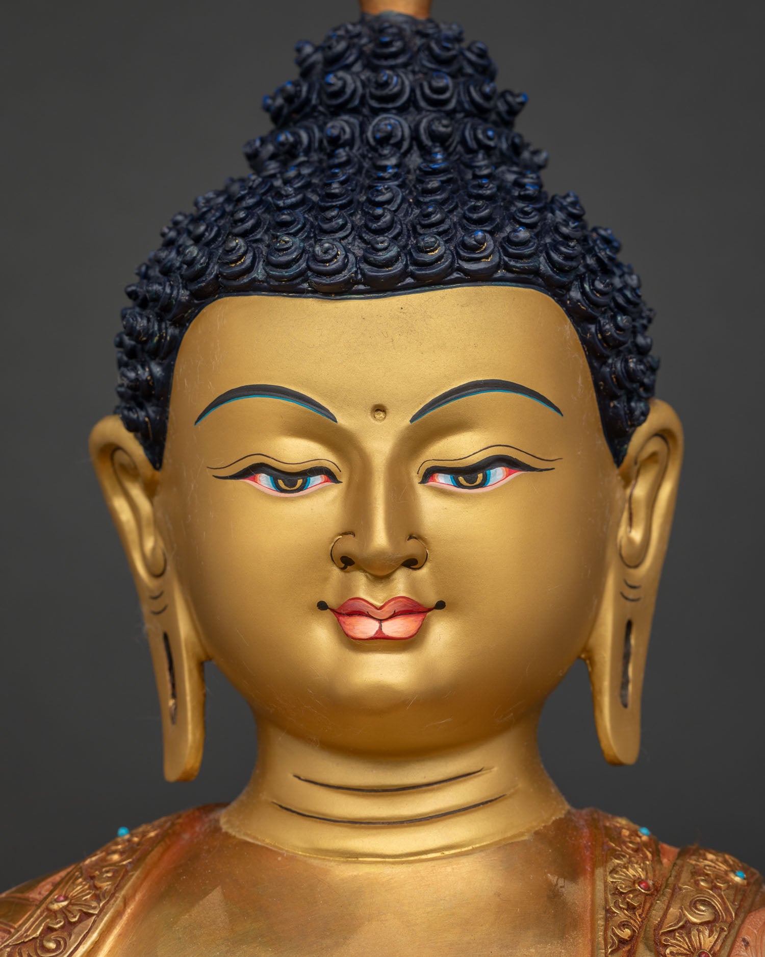Amitabha Buddha face detail, 24K gold-painted serene expression, handcrafted Nepal copper sculpture