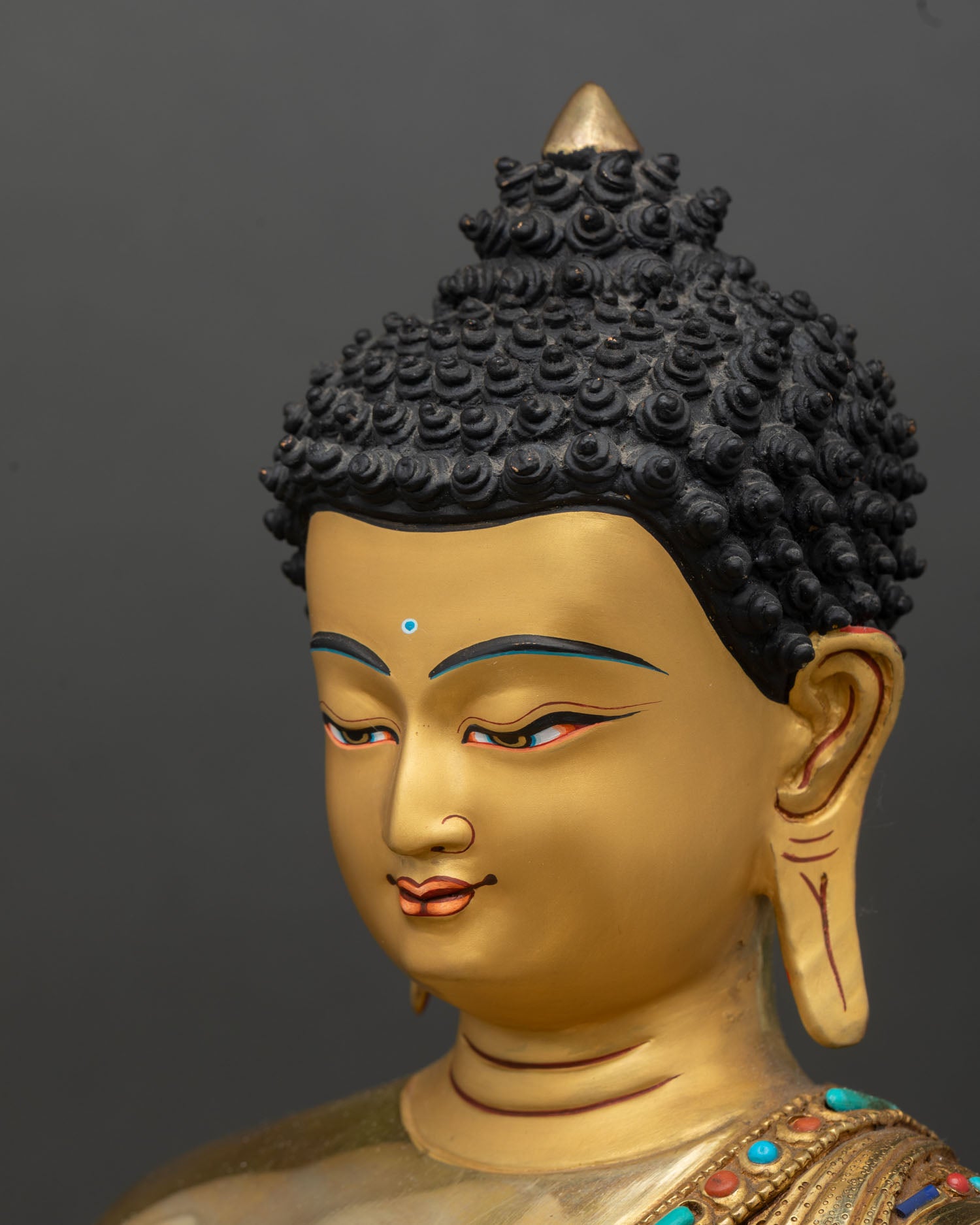 amitabha buddha side face close up, peaceful expression gold gilded himalayan art