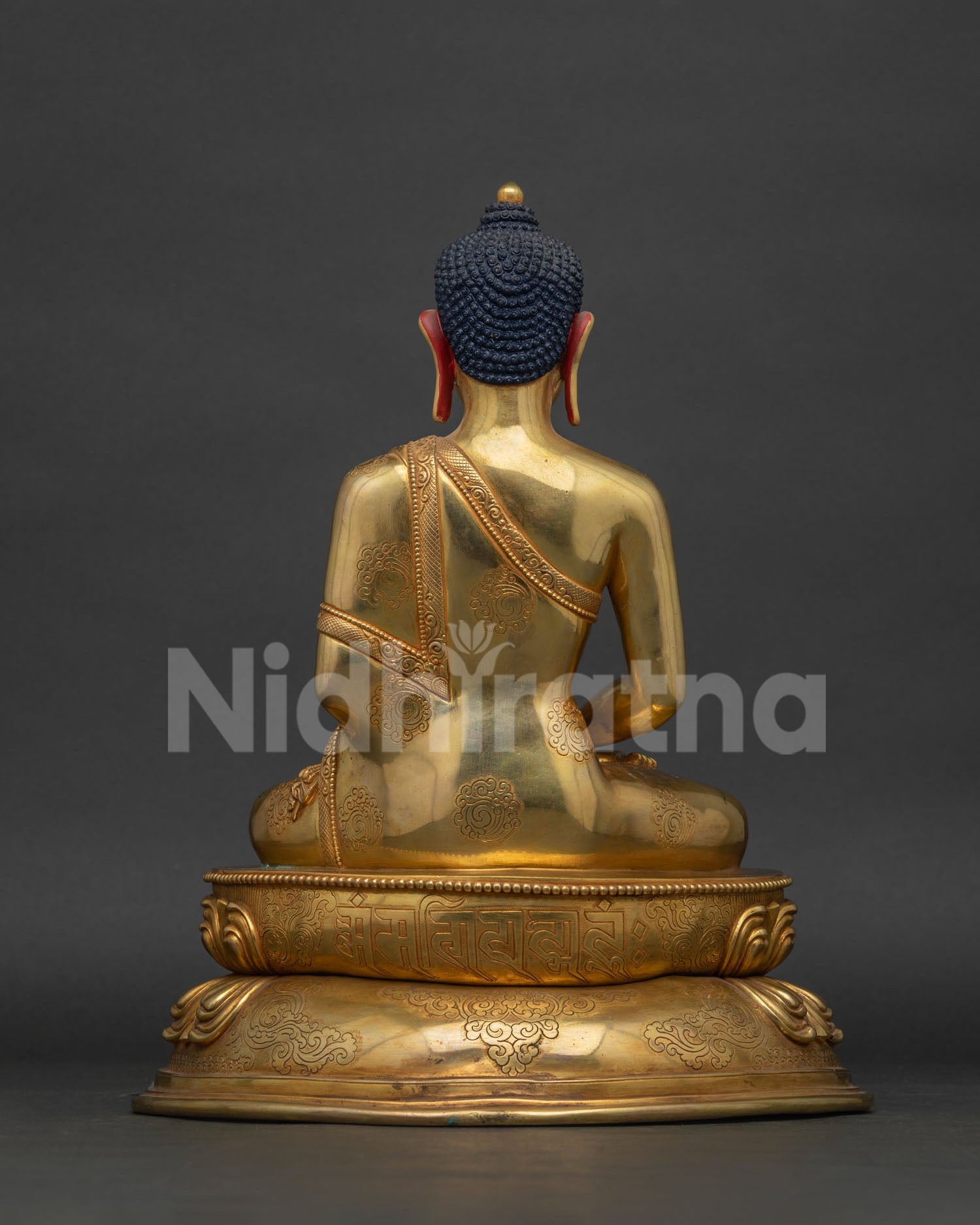 Amitabha Buddha statue back view sacred mantra carved lotus pedestal Nepal