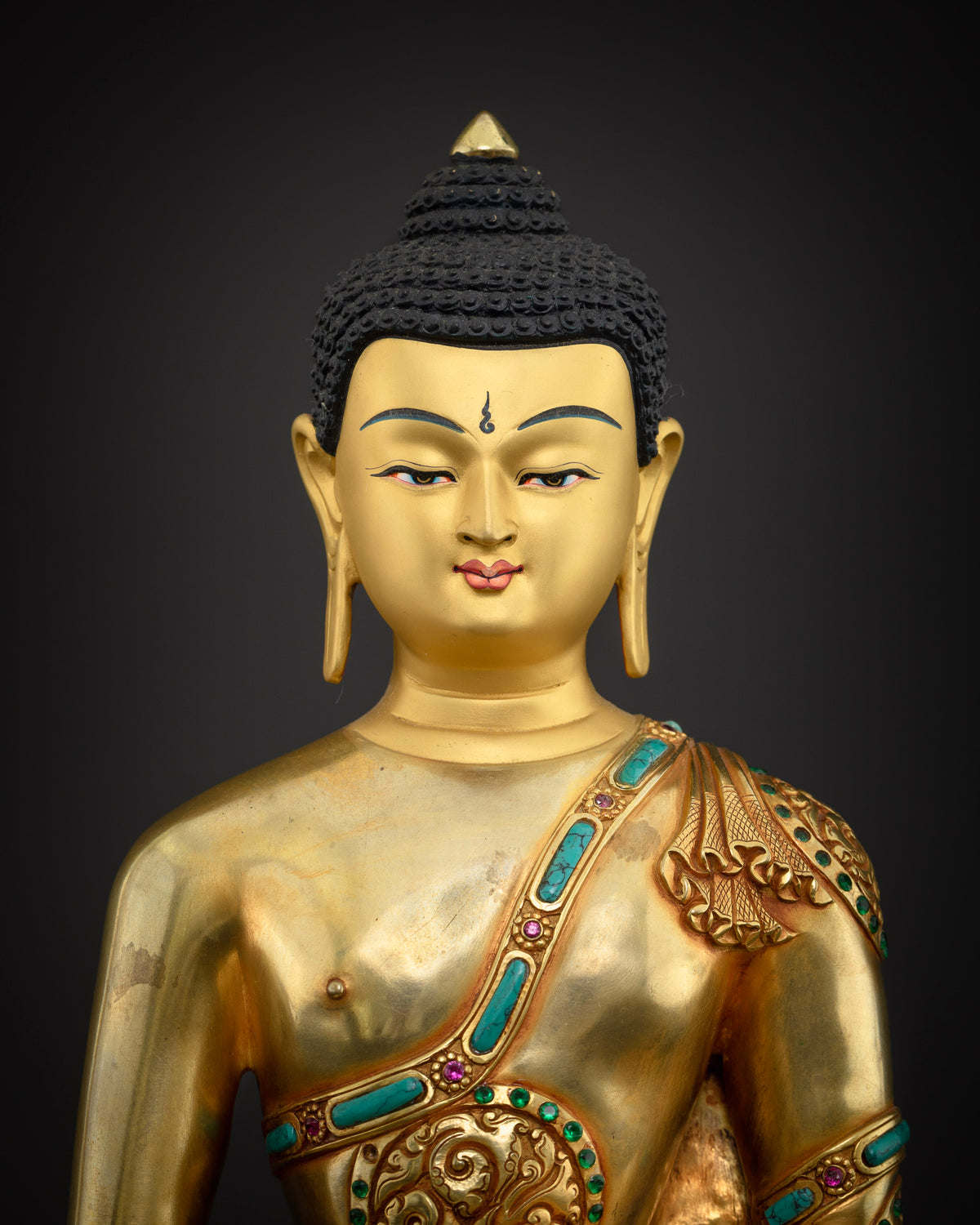 Amitabha Buddha statue close-up, gold fire-gilded copper with semi-precious stones