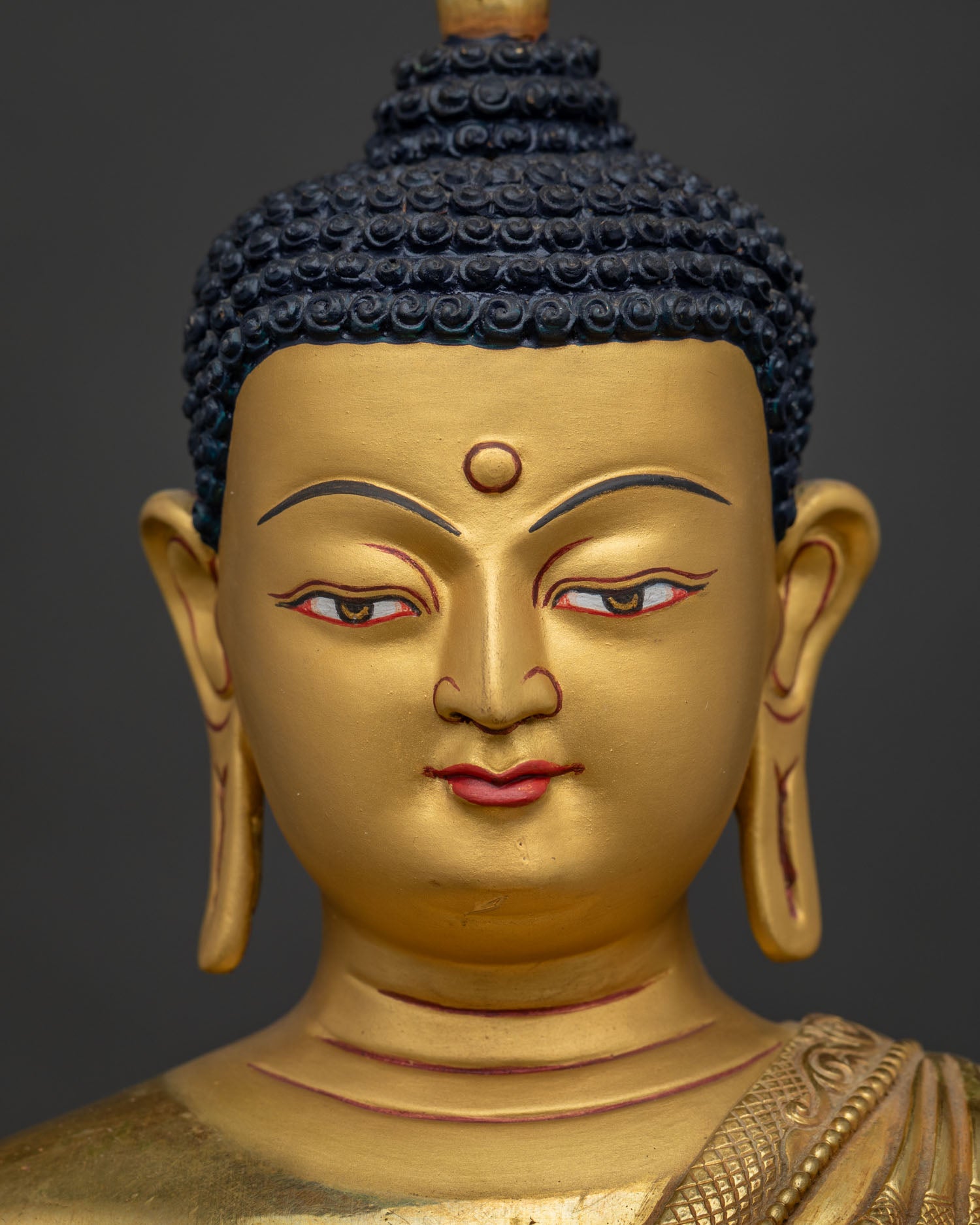 Amitabha Buddha statue detailed close up face 24K gold painted facial details
