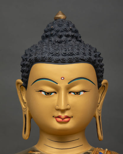 Amitabha Buddha Statue face close-up, serene gold-painted expression