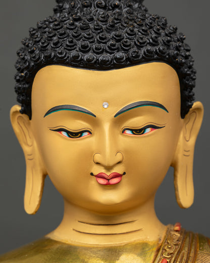 Amitabha Buddha Statue Face Close Up with 24K Gold Painted Serene Expression