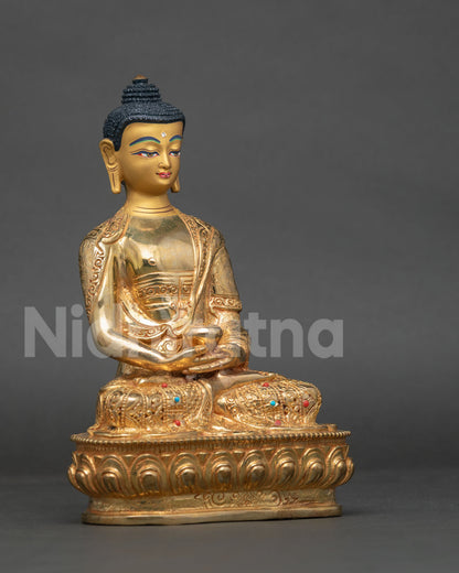 Amitabha Buddha statue floral motif robe semi precious stones.