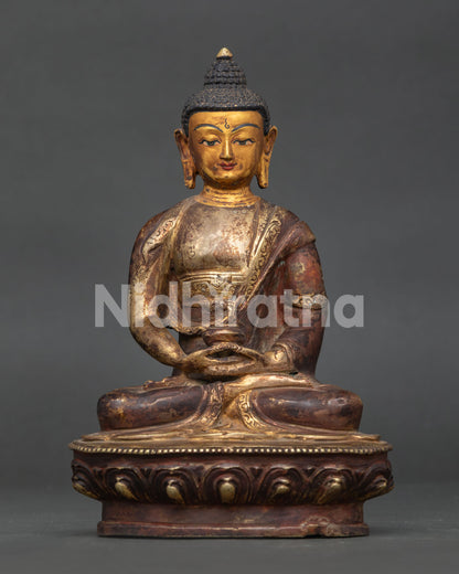 Amitabha Buddha statue handcrafted by Newari artisans in Patan Nepal with gold fire-gilded oxidized finish.