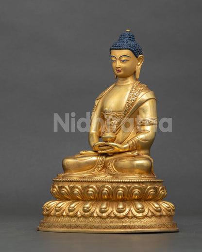 Amitabha Buddha statue monastic robe alms bowl gold fire gilded copper.