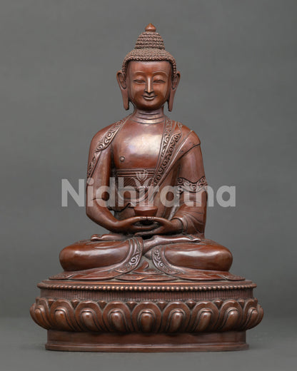 Amitabha buddha statue seated on lotus throne holding alms bowl in meditation posture.