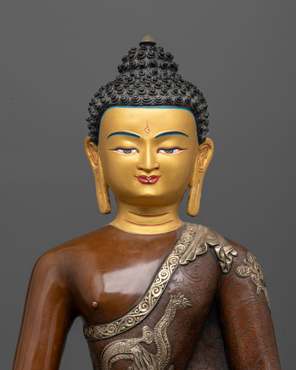 Amitabha Buddha statue with 24K gold painted face and peaceful expression.