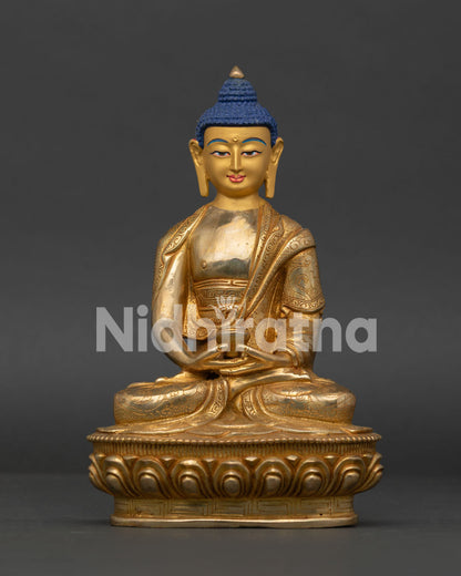 Amitabha Buddha statue with gold painted face seated in Dhyana Mudra on lotus pedestal.