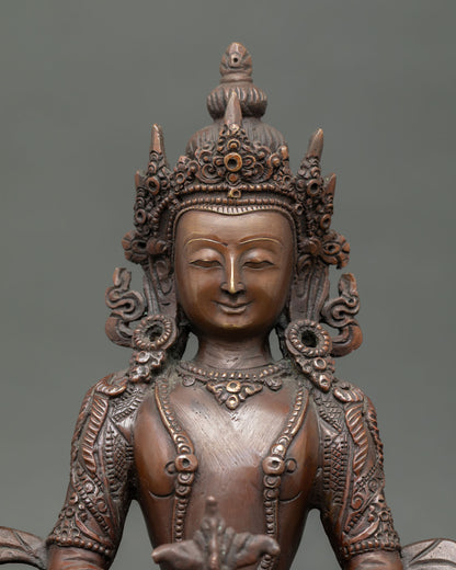 Amitayus Buddha face with an oxidized finish, Nepalese Buddhist art.