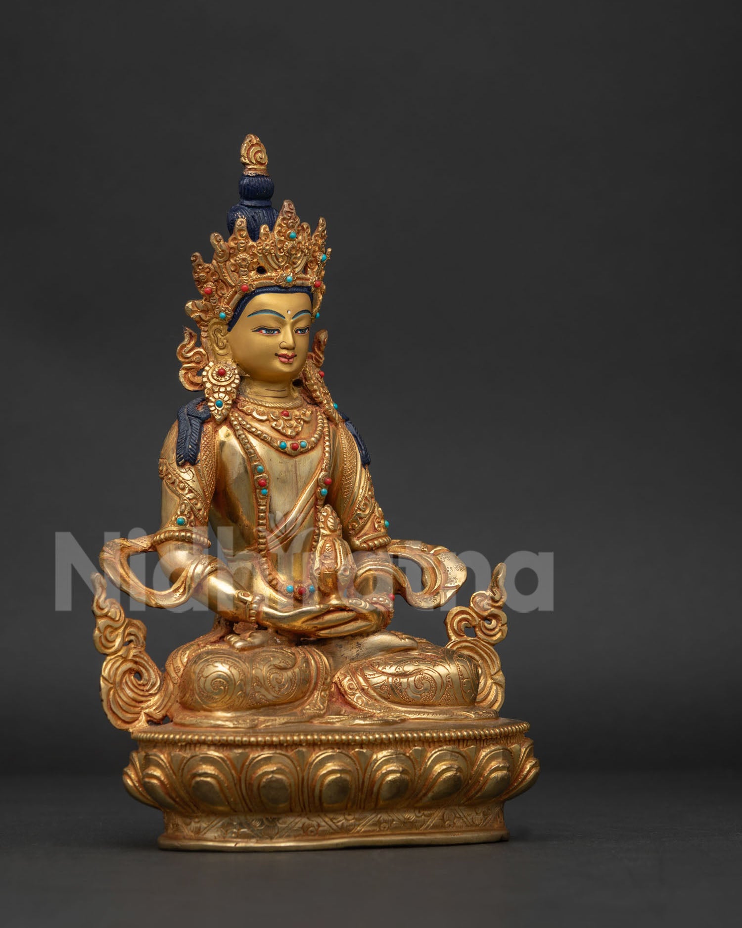 Amitayus Buddha in Dhyana Mudra holding longevity vase on lotus.