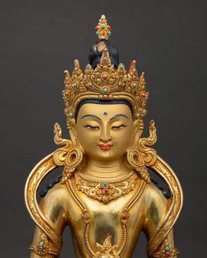 Amitayus Buddha sculpture close-up showing intricate copper details and sacred Buddhist artistry