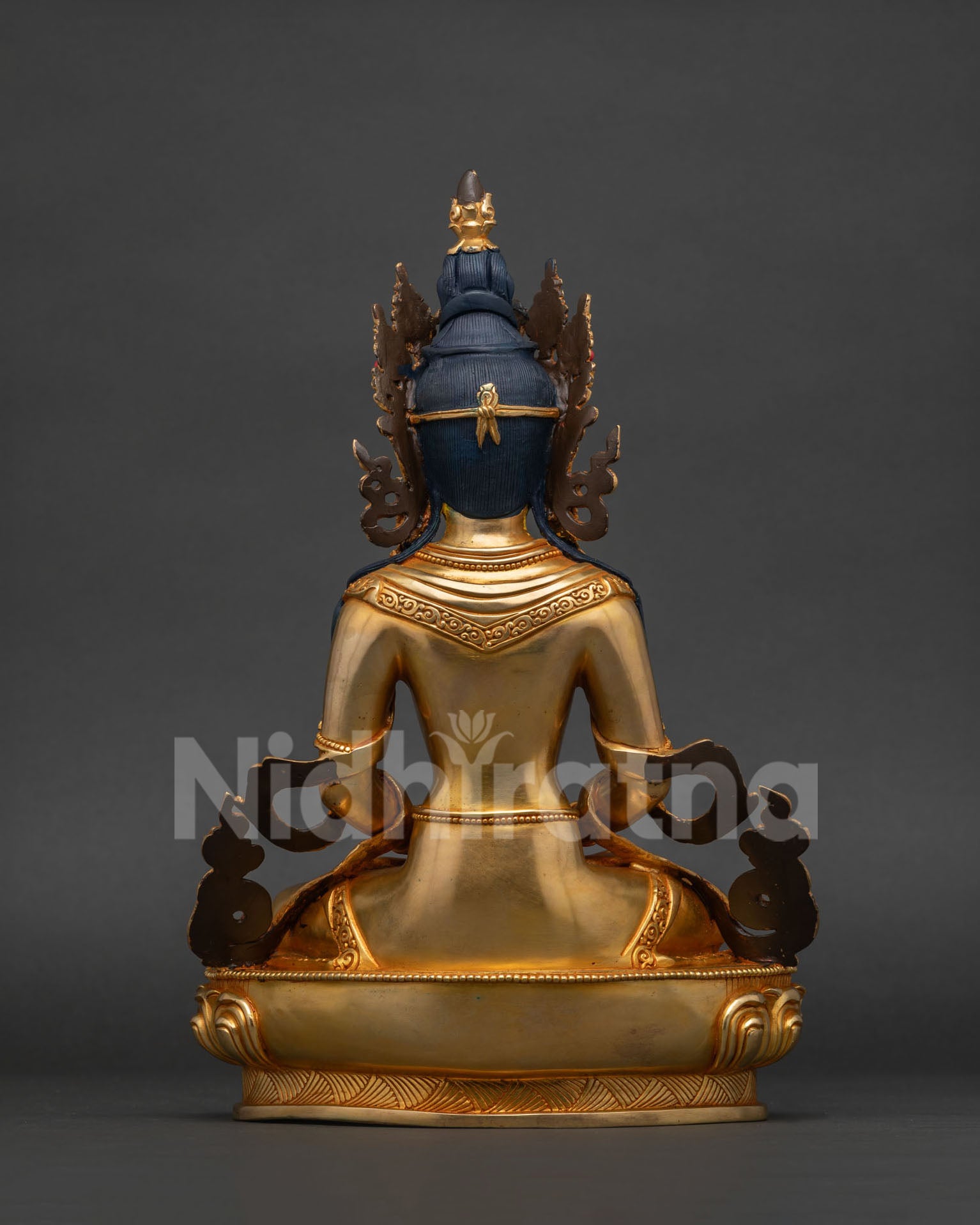 Amitayus Buddha statue back view, intricate repoussé garment detail, Nepal art