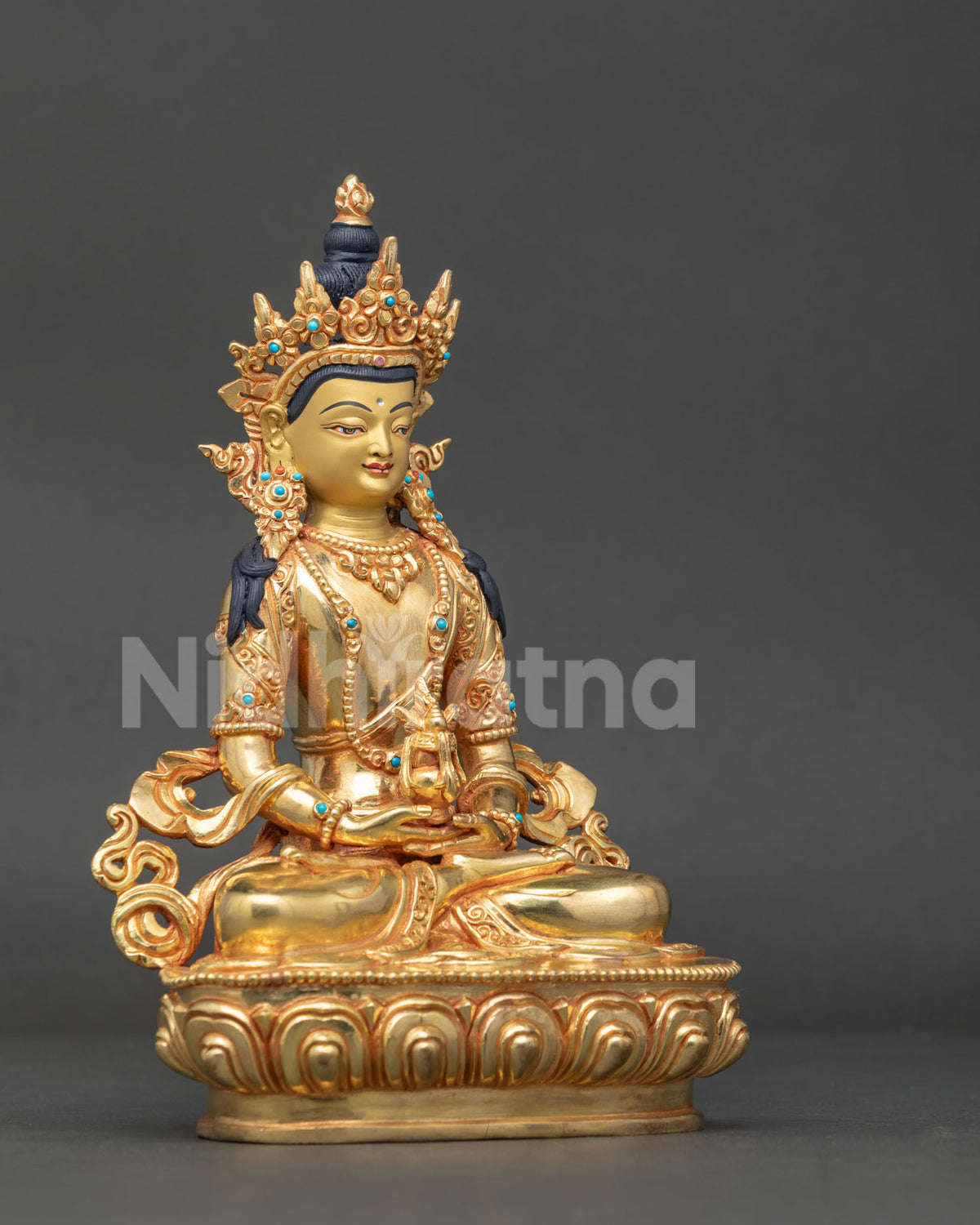 Amitayus buddha statue handcrafted by newari artists from patan nepal with 24k gold face.
