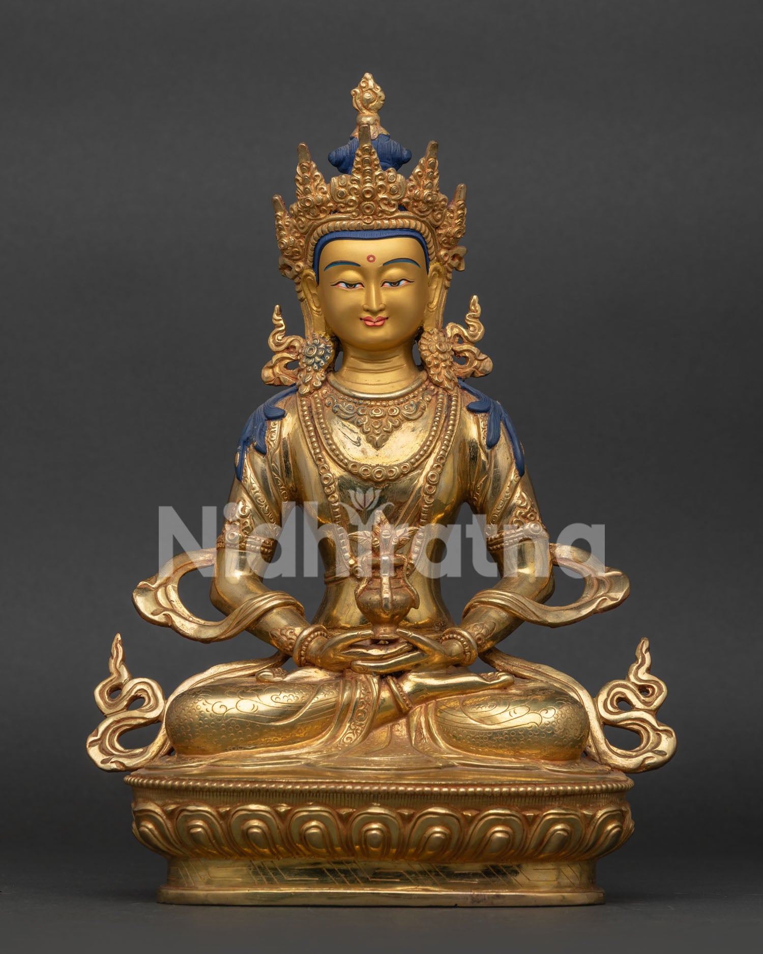 Amitayus Buddha Statue handcrafted in Nepal with gold fire gilded finish and lotus pedestal.