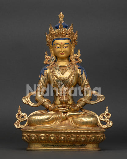 Amitayus Buddha Statue handcrafted in Nepal with gold fire gilded finish and lotus pedestal.