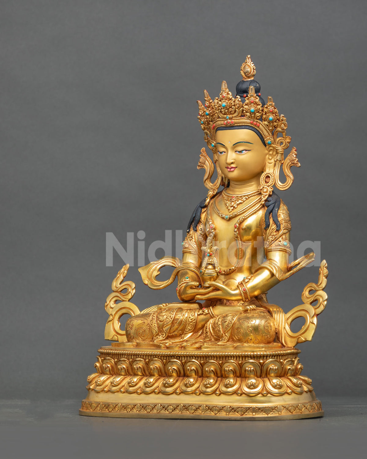 Amitayus Buddha Statue left side view five jewel crown floral silk garment.