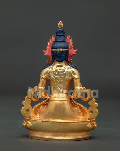 Amitayus Buddha statue on lotus pedestal with detailed Nepalese craftsmanship.