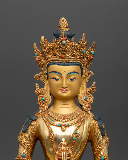 Amitayus Buddha statue with 24K gold face, turquoise and coral stone details.