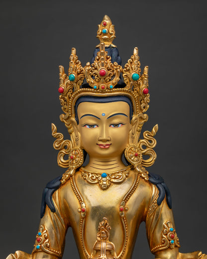 Amitayus statue close-up: jeweled crown, kalasha vase & gold gilded details, Nepal art